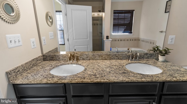 bathroom featuring vanity and plus walk in shower