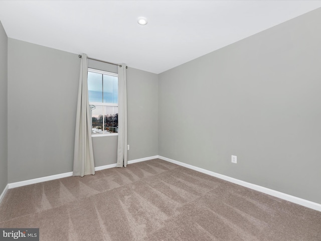 empty room with carpet floors