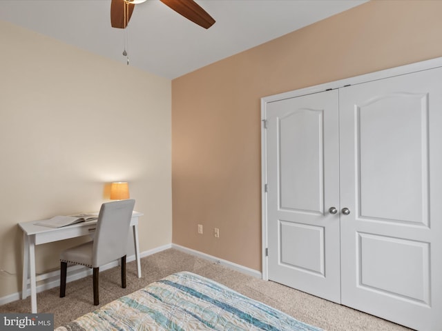 bedroom featuring carpet floors, a closet, and ceiling fan