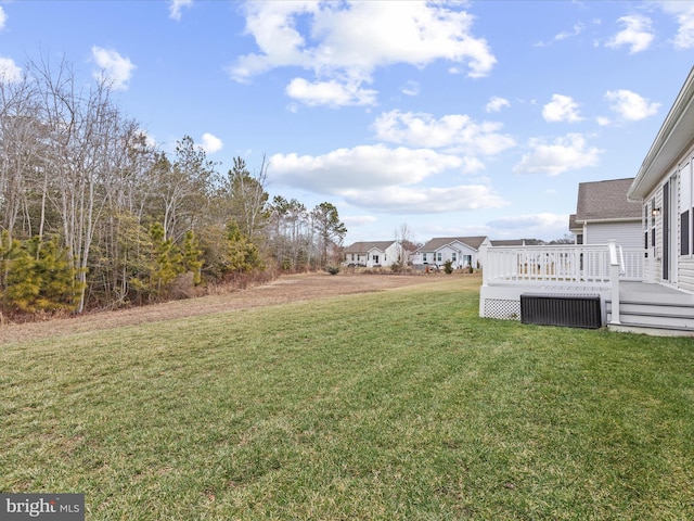 view of yard featuring a deck