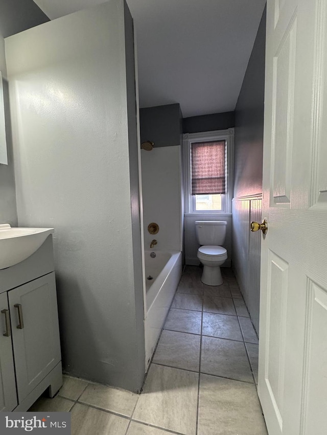 full bathroom featuring toilet, vanity, shower / bathing tub combination, and tile patterned floors