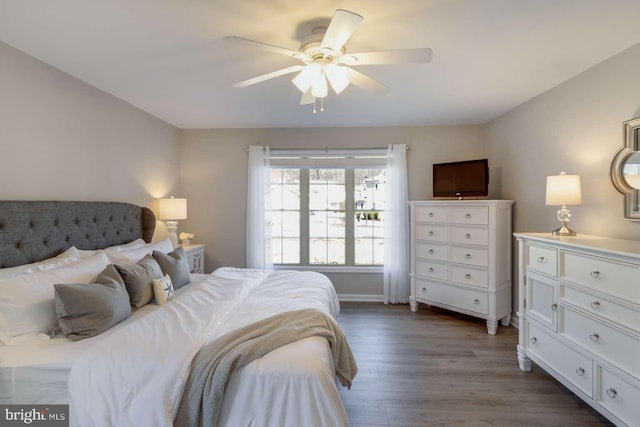 bedroom featuring ceiling fan and hardwood / wood-style floors