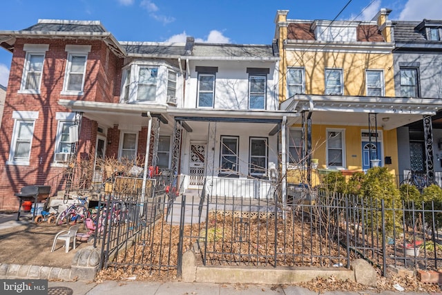 multi unit property featuring a porch