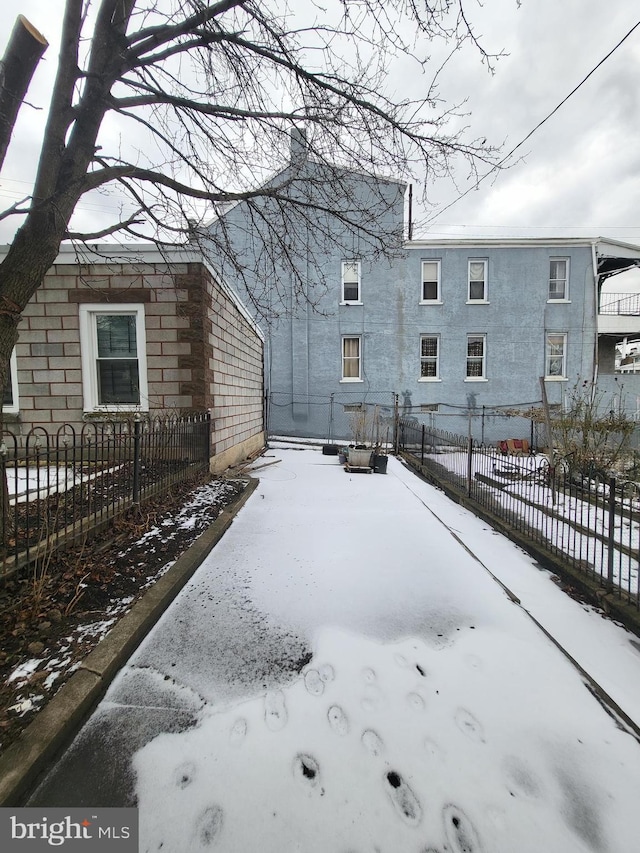 view of snow covered property