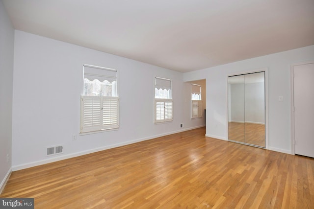 unfurnished bedroom with light hardwood / wood-style flooring