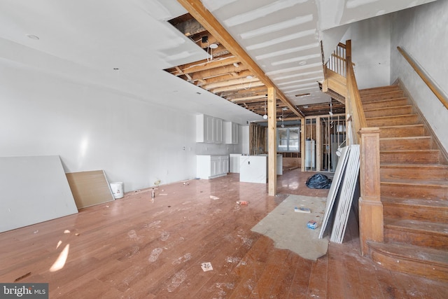 interior space featuring hardwood / wood-style flooring and water heater