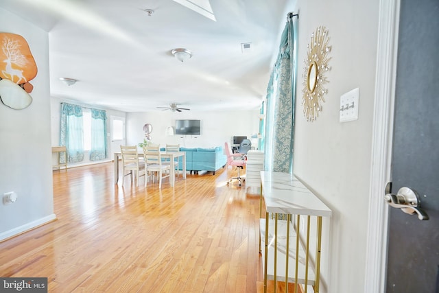 corridor featuring hardwood / wood-style flooring