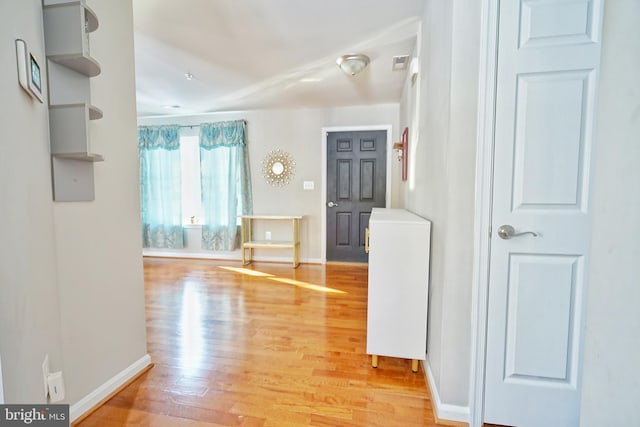 hall featuring light hardwood / wood-style flooring