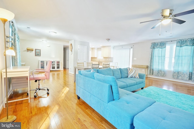 living room with light hardwood / wood-style flooring