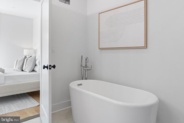 bathroom featuring a tub