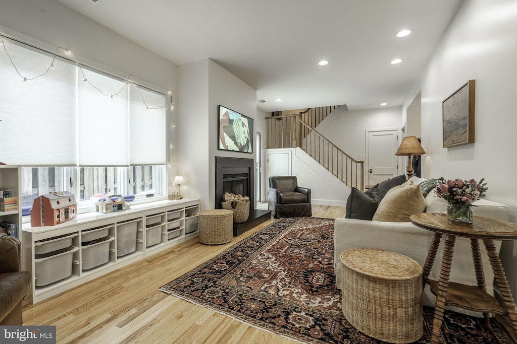 living room with light hardwood / wood-style floors