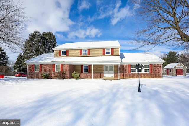 view of front of property featuring an outbuilding