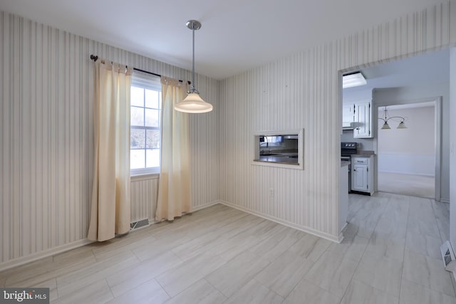 view of unfurnished dining area