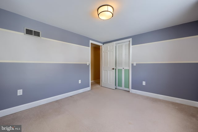 unfurnished bedroom featuring a closet