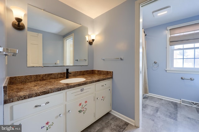 bathroom featuring vanity