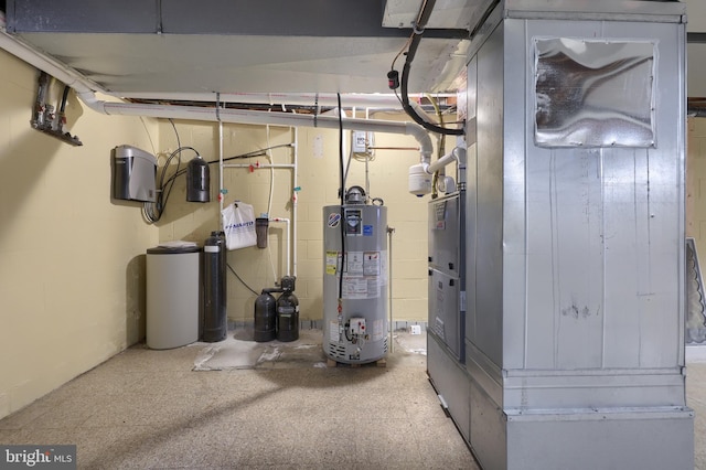 utility room featuring gas water heater