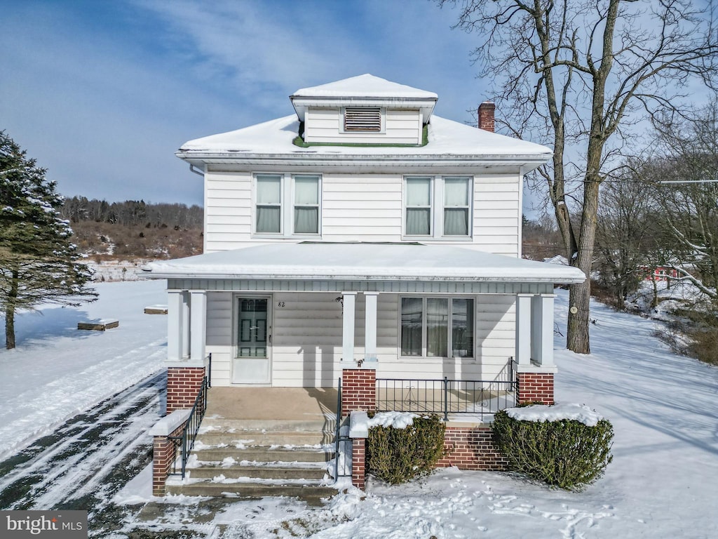 view of property with covered porch