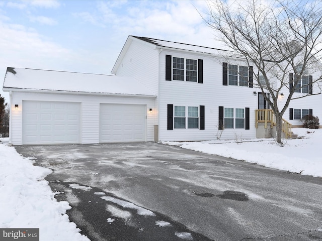 view of front of property featuring a garage