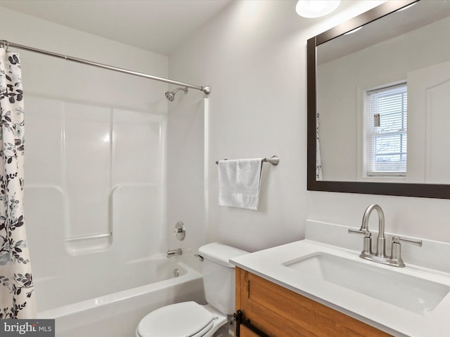 full bathroom with shower / bathtub combination with curtain, vanity, and toilet