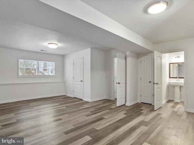 bonus room with hardwood / wood-style floors