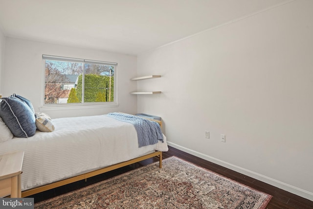 bedroom featuring dark hardwood / wood-style floors