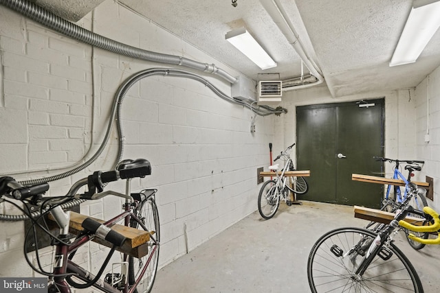 basement featuring a textured ceiling