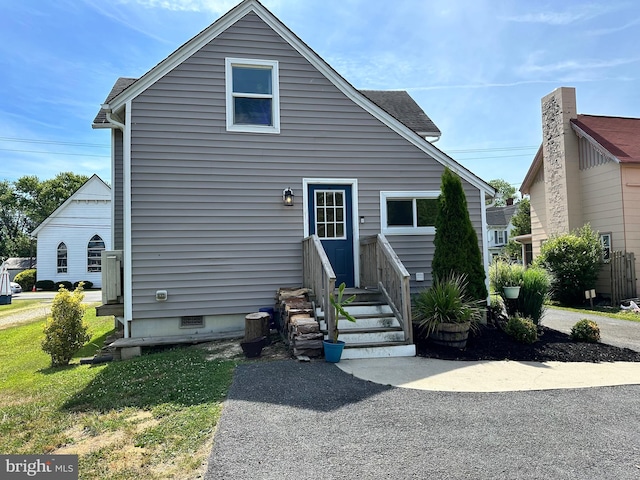 exterior space with a front yard