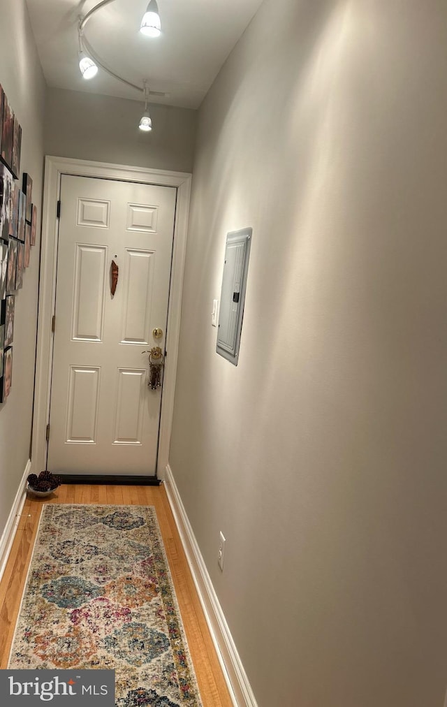 doorway with light wood-type flooring