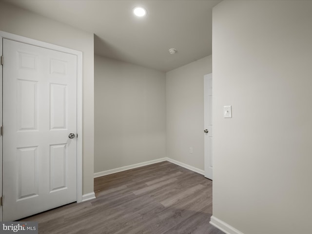 spare room featuring light wood-type flooring