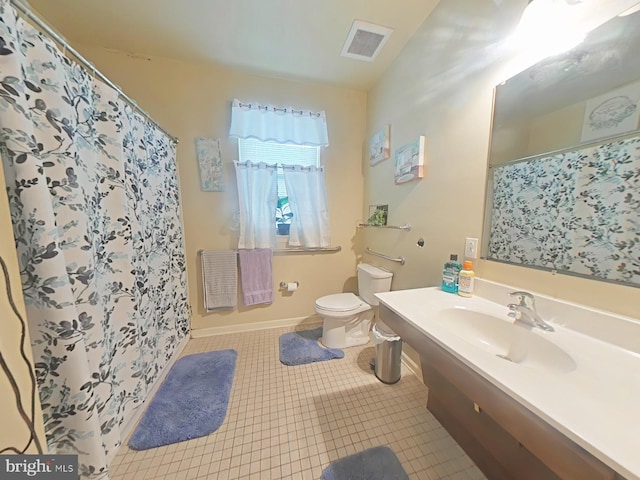 bathroom with tile patterned flooring, vanity, a shower with shower curtain, and toilet