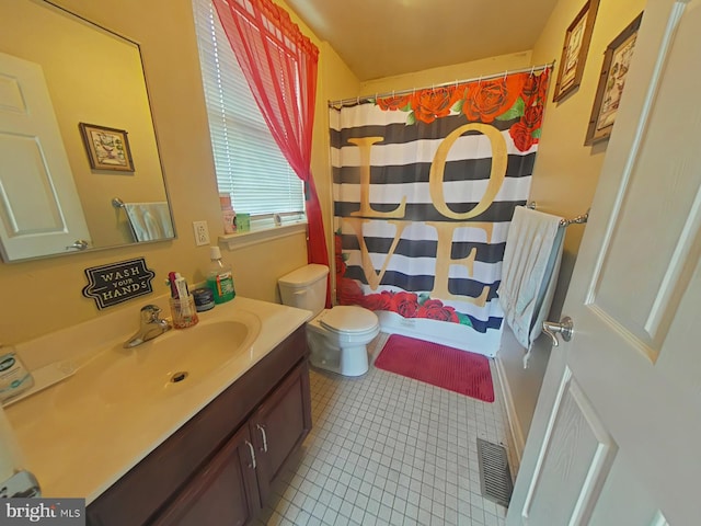 bathroom featuring tile patterned floors, toilet, curtained shower, and vanity