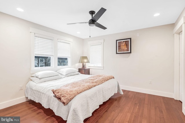 bedroom featuring ceiling fan and wood-type flooring