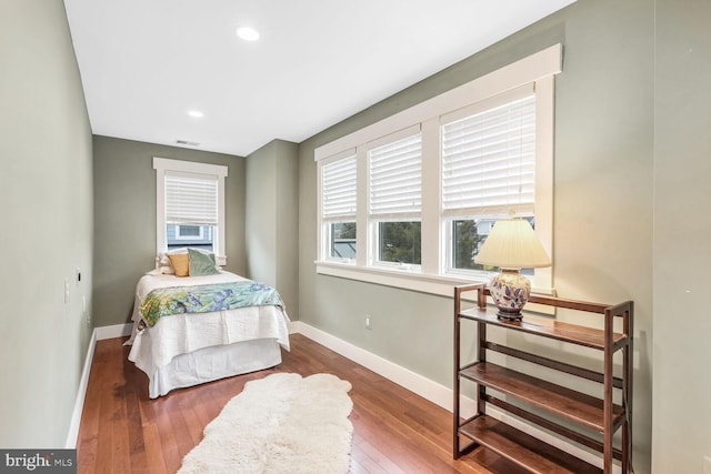 bedroom featuring hardwood / wood-style flooring