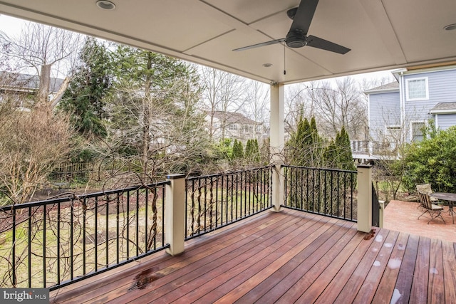 wooden terrace with ceiling fan