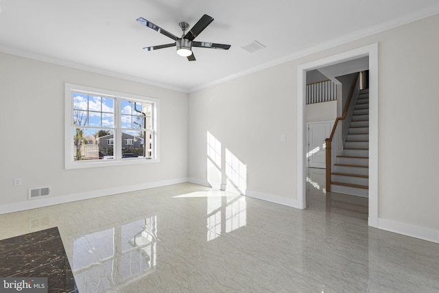 unfurnished room featuring ceiling fan and crown molding