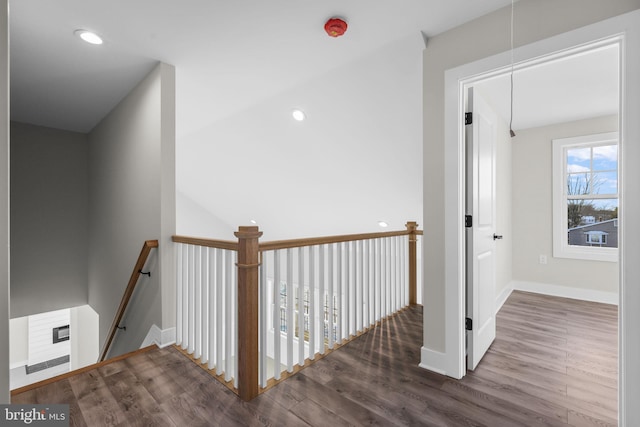 stairs with hardwood / wood-style floors