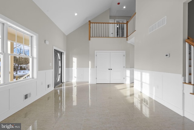 interior space with high vaulted ceiling