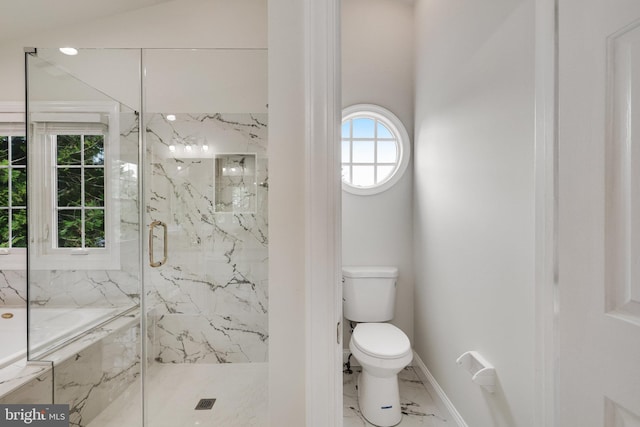 bathroom with toilet and an enclosed shower