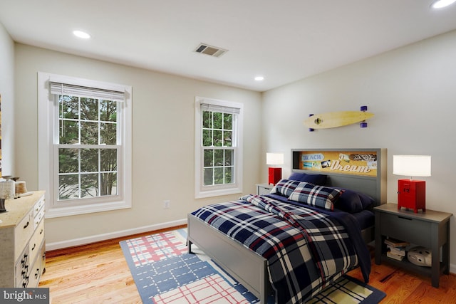 bedroom featuring light hardwood / wood-style flooring