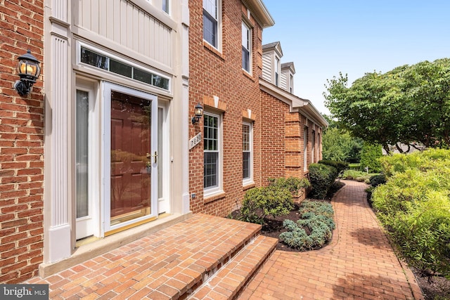 doorway to property featuring a patio