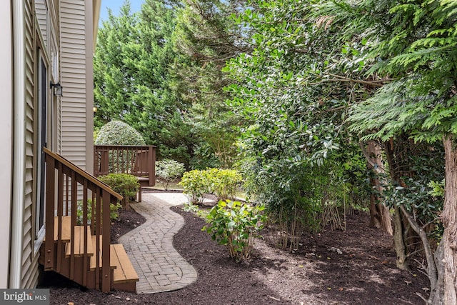 view of yard with a wooden deck