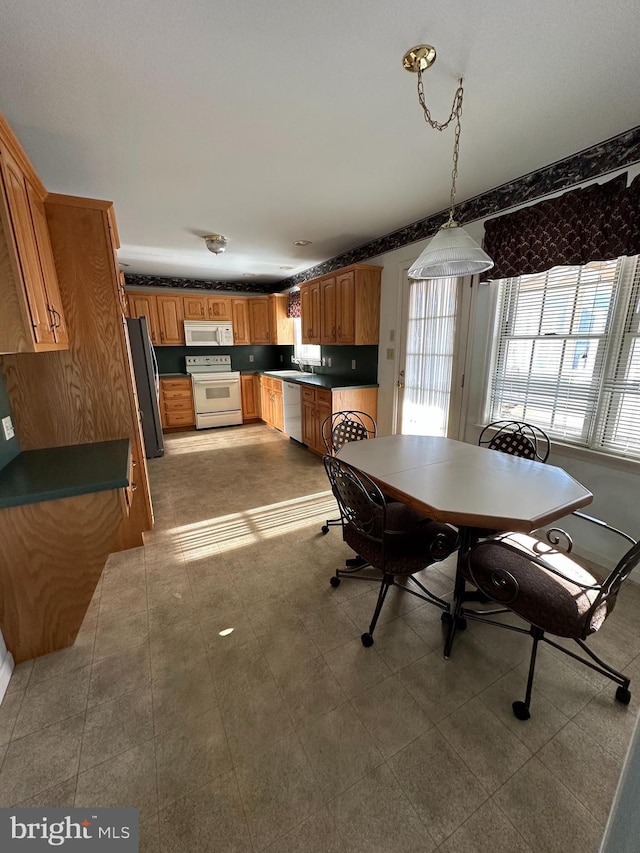 dining space with sink