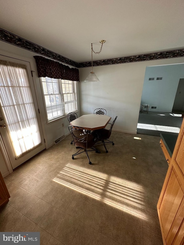 view of tiled dining room