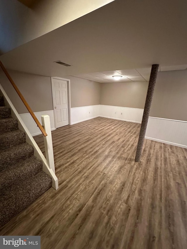 basement featuring hardwood / wood-style flooring