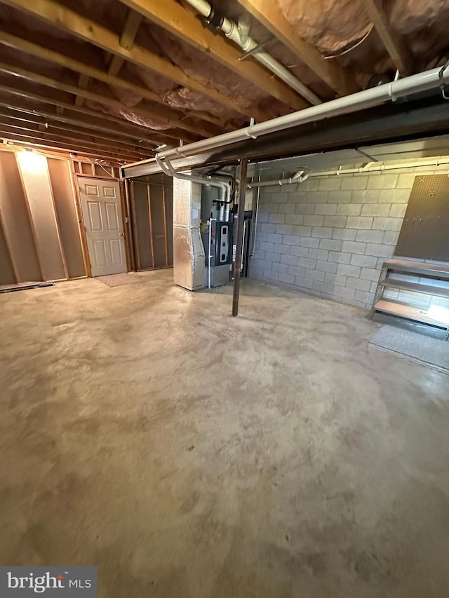 basement featuring heating unit