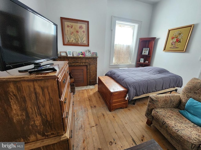 bedroom with light wood-type flooring