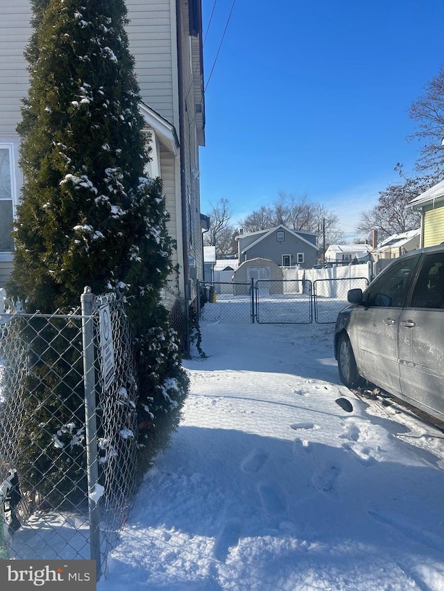 view of yard covered in snow