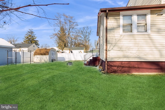 view of yard with a storage unit