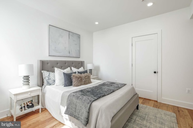 bedroom featuring hardwood / wood-style floors