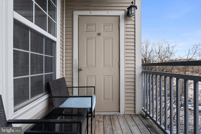 doorway to property featuring a balcony